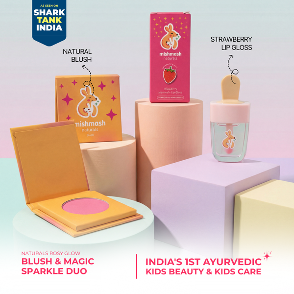 Collection of kids' beauty products including blush, lip gloss, and body glow on a pastel background with 'Shark Tank India' branding.