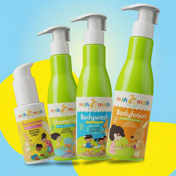 Set of children's skincare products including shampoo, bodywash, and bodylotion with 'mish & mash' branding on a colorful background.