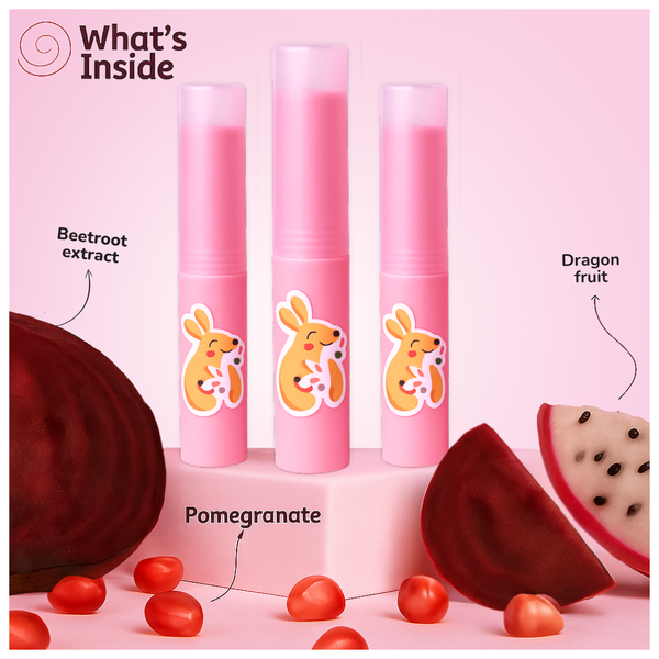 Pink Mishmash Naturals lip balms with kangaroo logo displayed with natural ingredients — beetroot extract, pomegranate, and dragon fruit. Text reads 'What’s Inside' highlighting the fruit-based extracts.